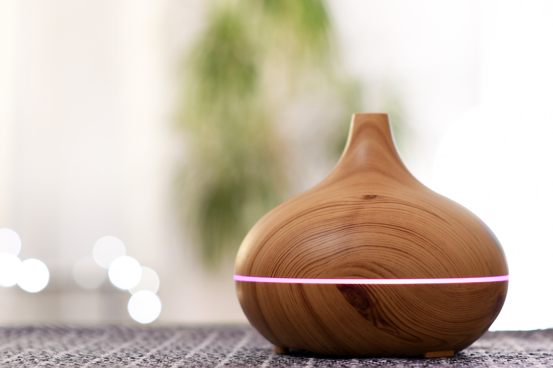 Essential oil diffuser on a table.